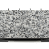 Granito en color blanco con negro, resistente y duradero, gris corumba disponible en Meinhaus Ecuador.